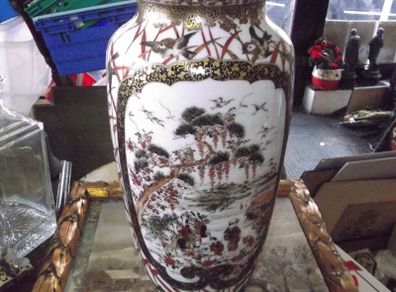 a tall antique chinese vase