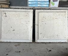 Two concrete paving slabs