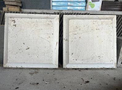Two concrete paving slabs