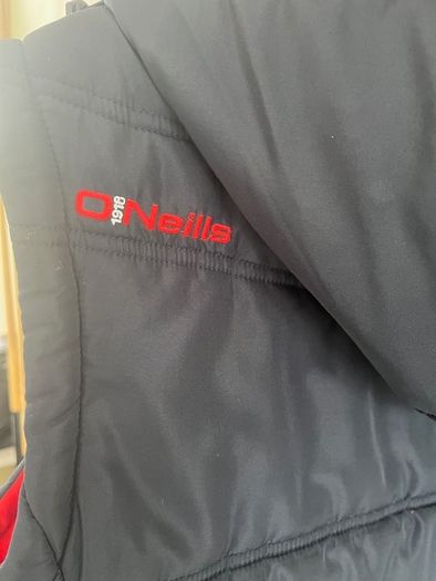 O'Neills CORK GAA Padded Puffer Gilet  jacket Navy. CORCAIGH. Detachable hood.  Size small adult. In Excellent condition