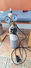 Co2 cylinder with inline defuser