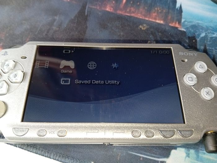 Sony Silver PSP 2003 Console - Works with Digital Games but wont load UMD Disks 16gb sd inc