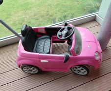 Toddlers pink beetle car