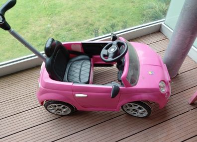 Toddlers pink beetle car