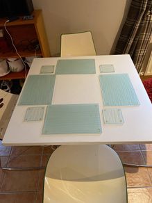 Table mats and coasters x 4. Glass with design