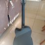 Black acoustic guitar Image 5