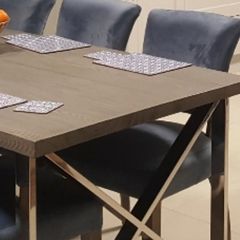 Grey dining table with chrome X legs