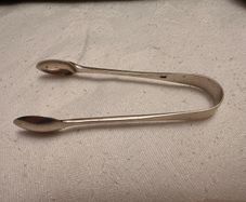 Antique silver tongs