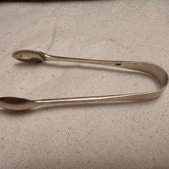 Antique silver tongs