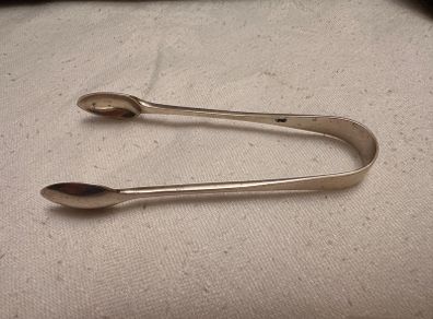 Antique silver tongs