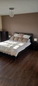 Brown leather bed