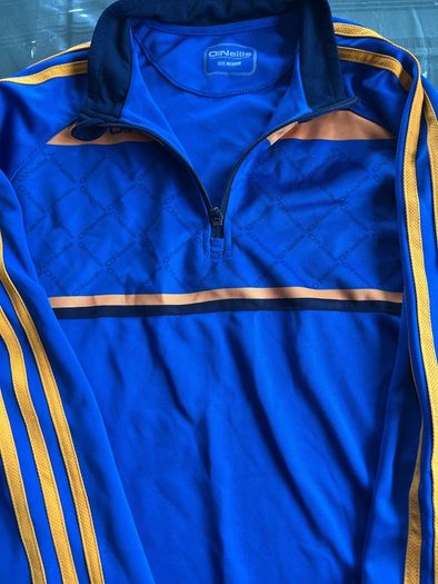 O'Neills half zip top.