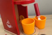 wooden coffee machine set with cups, spoons, pods