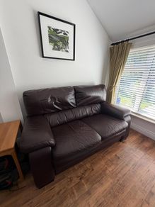 2 seater Arnotts leather couch