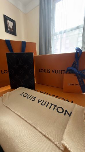 Louis Vuitton passport holder