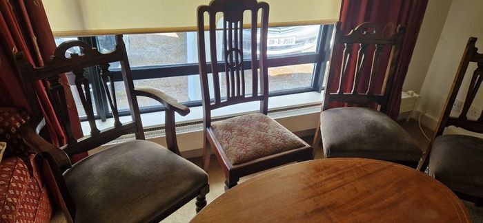 mahogany coffee table and 6 chairs, corner cabinet , 3 crystal bowls