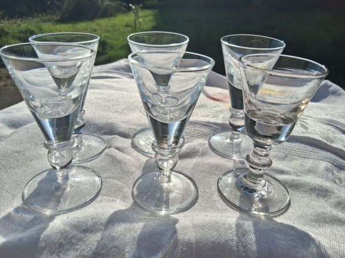 A Set of Cumbria Ware Hand Blown Toasting Glasses