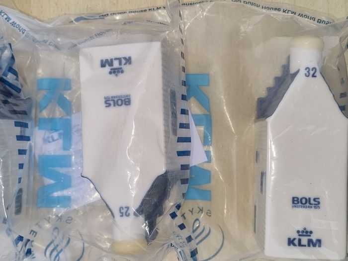 Collection of 7 porcelain miniature KLM Delft Blue houses