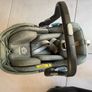 This is an UPPAbaby Mesa i-Size Infant Car Seat in a green-toned fabric. Image 3