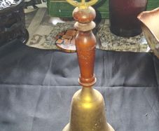 Vintage Brass School Bell with a turned wooden handle and a ring shaped top