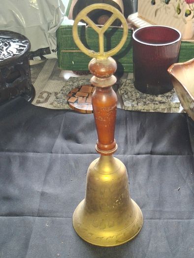 Vintage Brass School Bell with a turned wooden handle and a ring shaped top