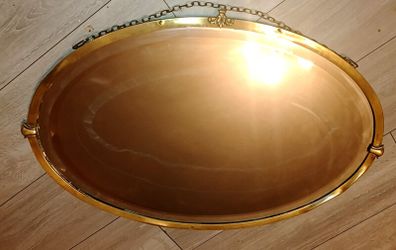 Large antique oval bevelled mirror with brass