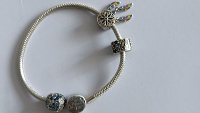 Pandora charm bracelet with assorted charms