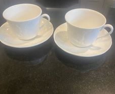 Wedgwood strawberry and vine cups and saucers