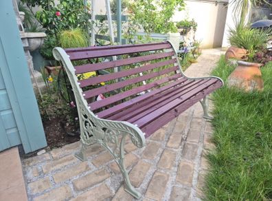 Garden bench, cast iron, beautiful design, restored seat, outdoor garden seating, treated timber decorations, furniture patio decking, great present. Ignore flowers, pots, plants, garden statue, chair, swing, patio table, balcony.