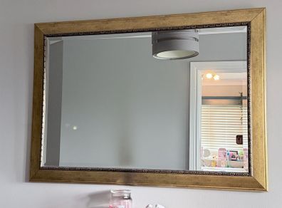 Large golden mirror