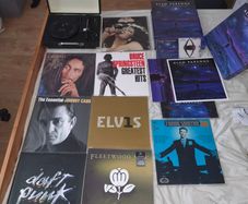Vinyl record collection and record player.