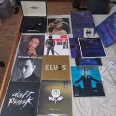 Vinyl record collection and record player.