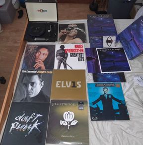 Vinyl record collection and record player.