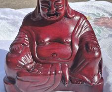 Seated Rosewood Smiling Buddha