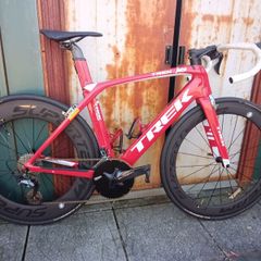 Trek Madone SL6 rim brake in vibrant red (not incl. wheels in pic).