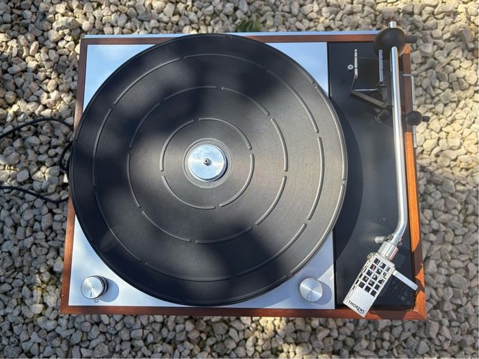 Absolutely immaculate factory condition Thorens Td 150 Mark II. With original side cut dust cover in incredible condition after 55 years. Hand-built in Switzerland and Germany and one of the most famous and highly-regarded turntables ever made.