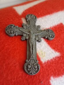 extremely old priest's crusifix cross