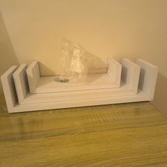 Three ikea shelves