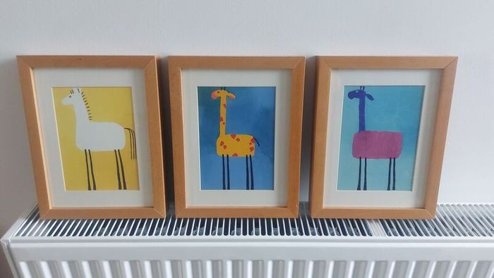 Lovely Set of Three Framed Prints of Brightly Coloured Artworks of Animals in a Naive And Fun Style Perfect for a Baby Nursery or Kids Bedroom