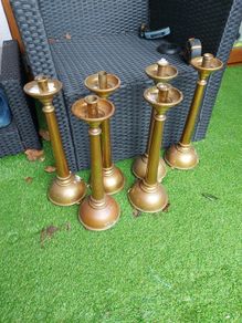 Solid brass candlesticks. X 6 .  45cm high