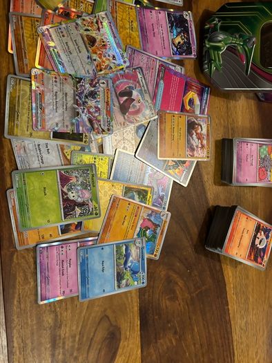 Surging Sparks Bundle Approx. 400 Cards & Paradox Clash Collector Tin