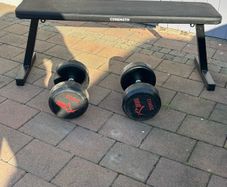 gym bench and weights