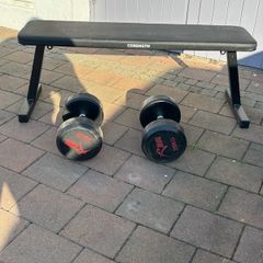 gym bench and weights