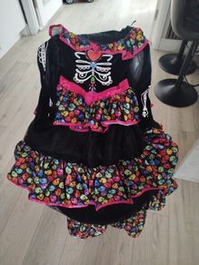 Sugar skull Halloween costume size 9-10 years old with headband included. Like new.