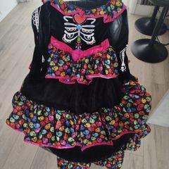 Sugar skull Halloween costume size 9-10 years old with headband included. Like new.