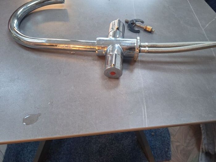 Steel kitchen tap