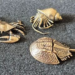 3 brass crabs,. Solid brass.