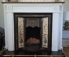 Extendable brass fireplace fender