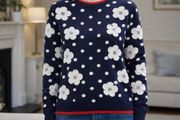 Ladies Jumper: Size 8 - White flowers on navy with it and trim