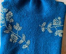 Embroidered knitted sleeveless top